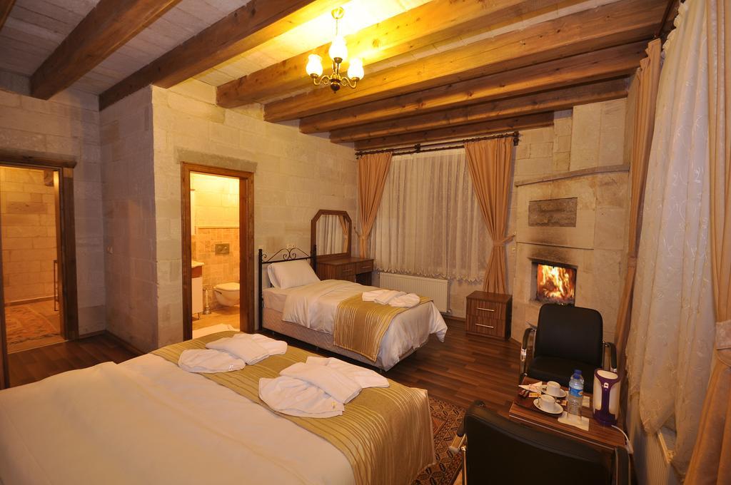 Cappadocia Stone Palace Гьореме Стая снимка