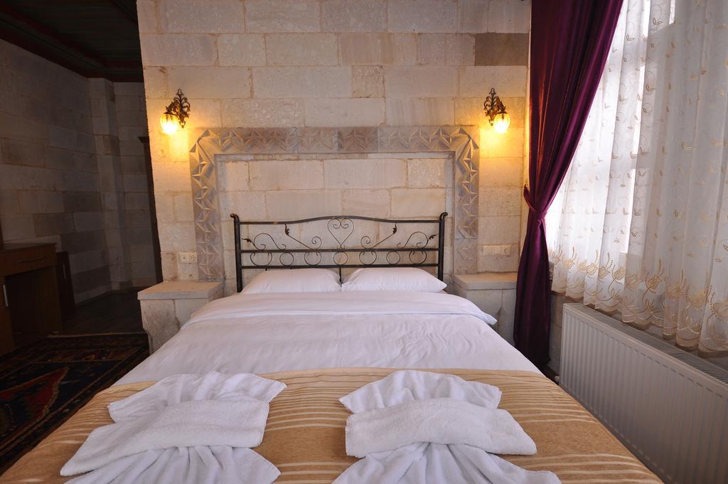 Cappadocia Stone Palace Гьореме Стая снимка
